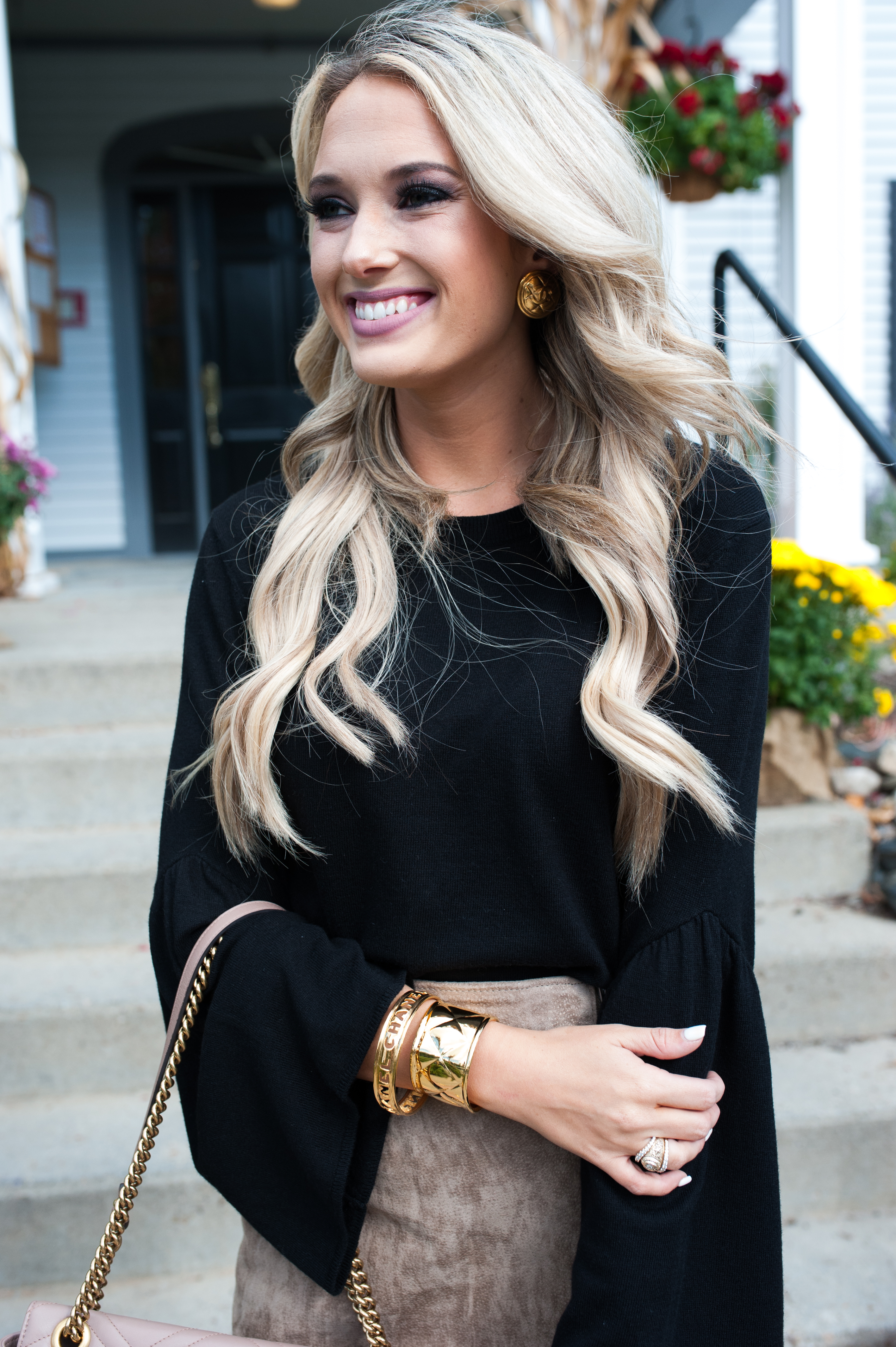 black sweater and suede skirt 