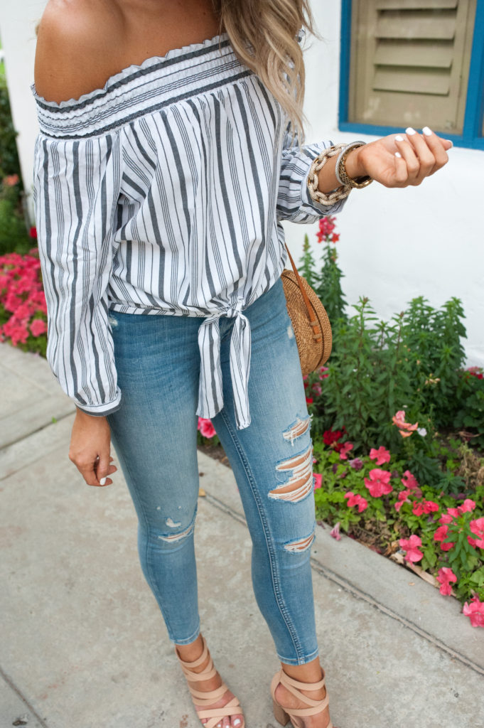 Striped top. Ripped jeans. Chanel ballet flats